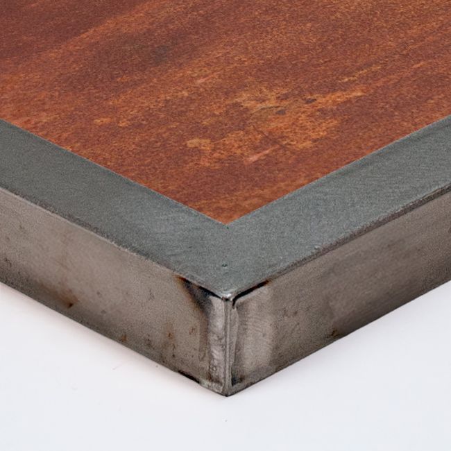 Sobre o tablero de mesa con marco en acero para hostelería. Acabado natural u óxido para dar un toque industrial o vintage a la mesa de un restaurante.