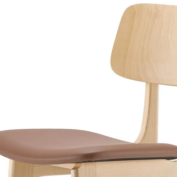 Taburete estilizado con asiento tapizado