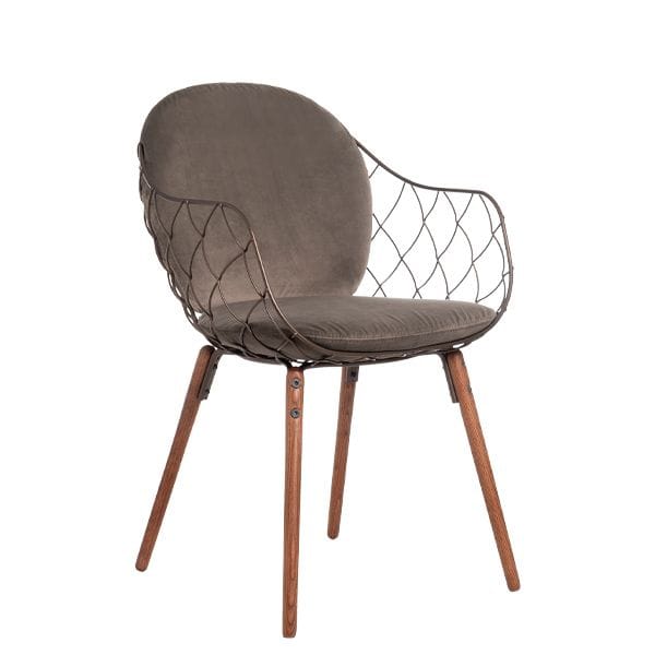 Sillón Piña Magis con estructura metálica entrelazada y cojines desenfundables